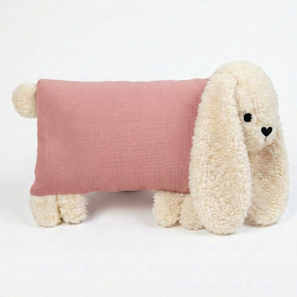 Altrosa Kuschelhase mit weichem Kopf, langen Schlappohren und rechteckigem Stoffkörper.