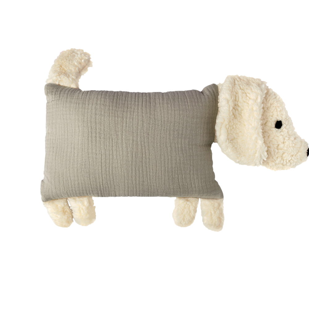 Beiger Kuschelhund mit weichem Kopf, Schlappohren und hochstehendem Schwanz.
