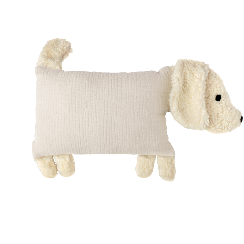 Naturfarbener Kuschelhund mit weichem Kopf, Schlappohren und hochstehendem Schwanz.