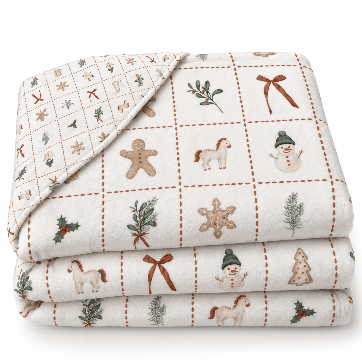 Gefaltete Kuscheldecke „Merry Patch“ mit umgeschlagener Ecke auf weißem Hintergrund.